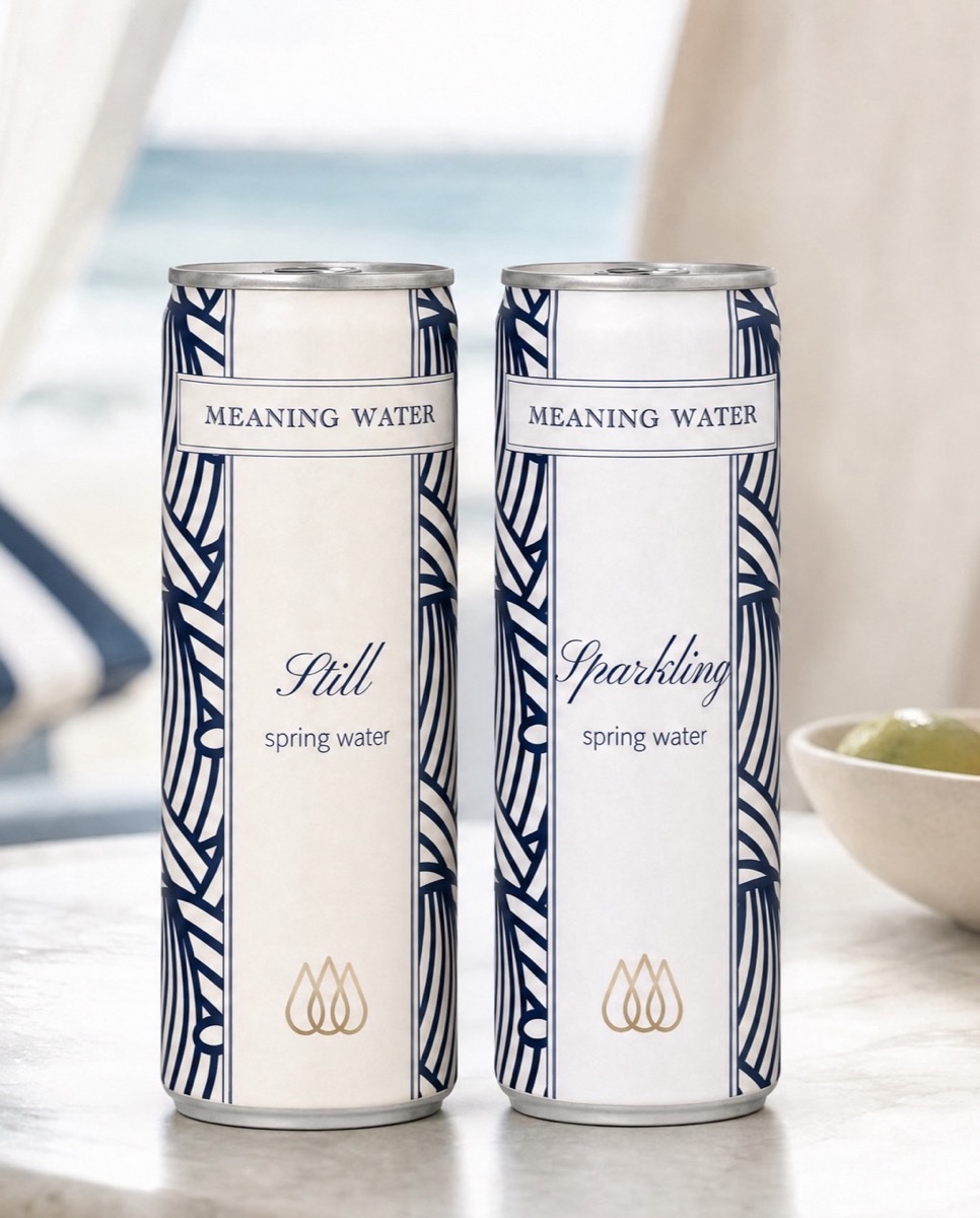 Meaning Water Still and Sparkling cans on a marble cabana table at a luxury hotel